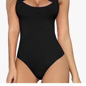 Black woman’s sleeveless body suit.